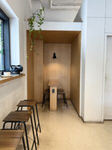 Cozy seating area inside Alexander Coffee Studio near Seolleung Station, Seoul